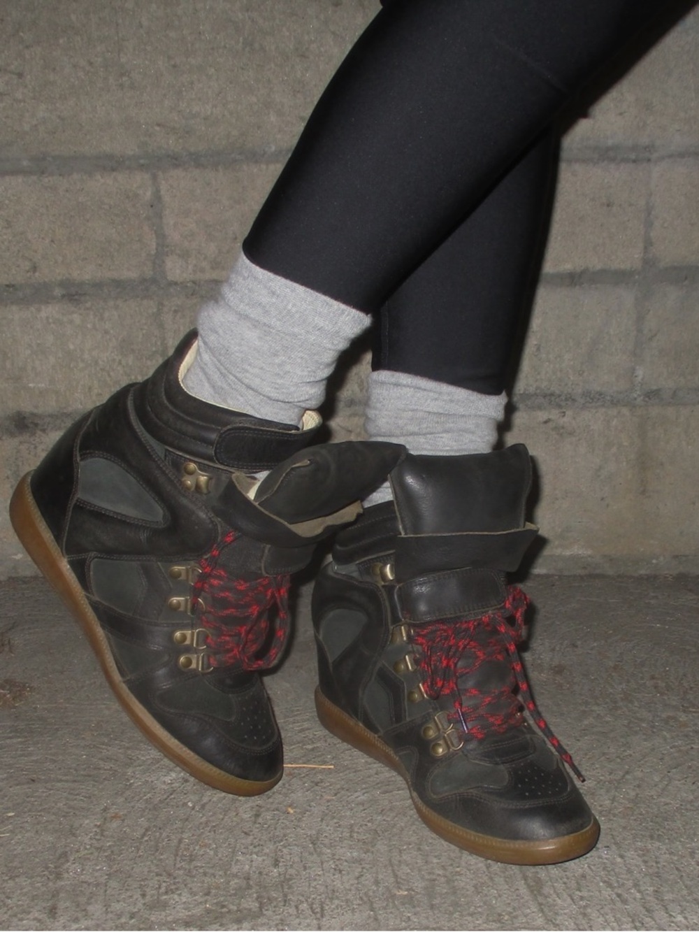 Authentic Isabel Marant wedge sneakers in black leather with red laces